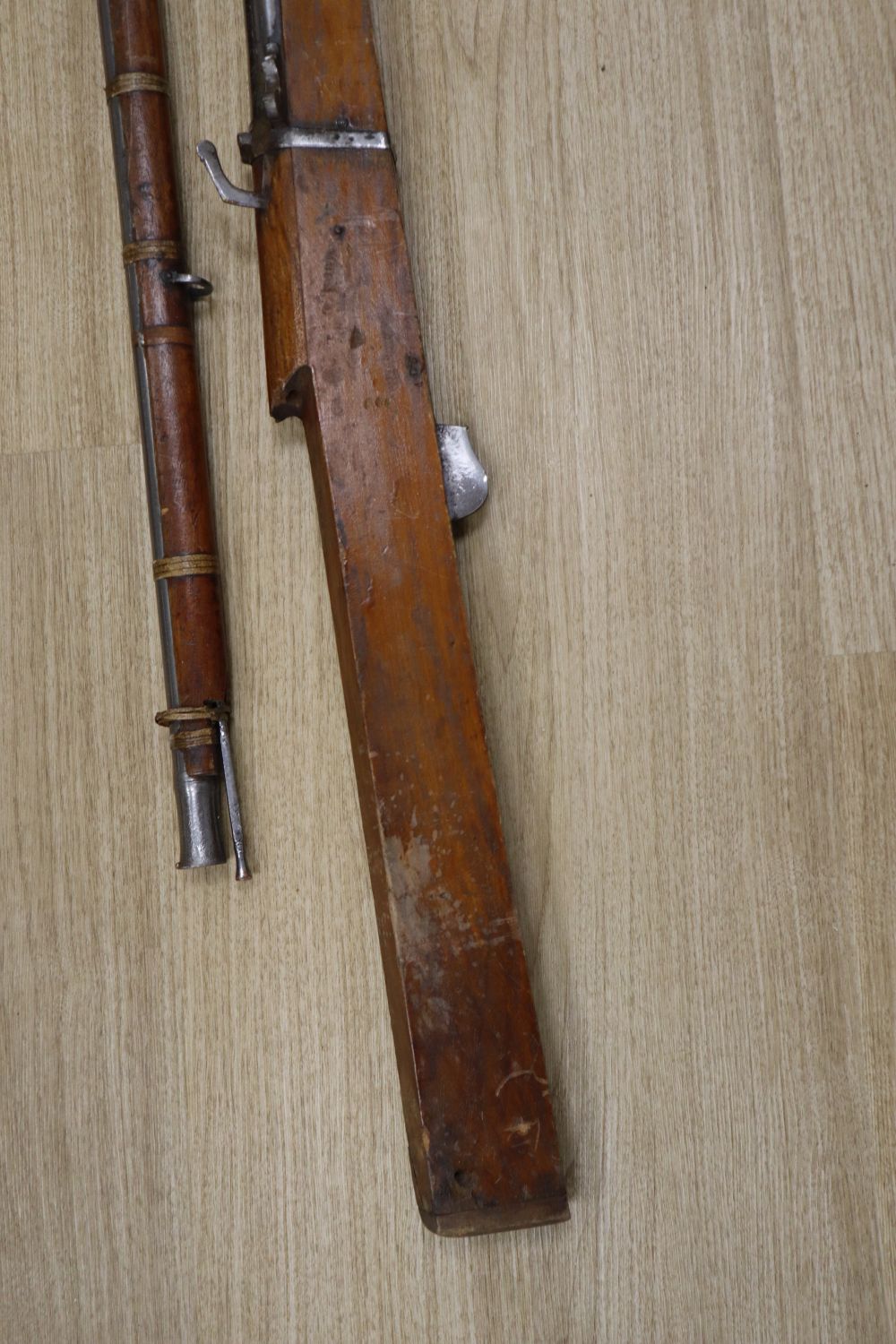 A long musket, overall 90 inches and two further longarms, all with ram-rods
